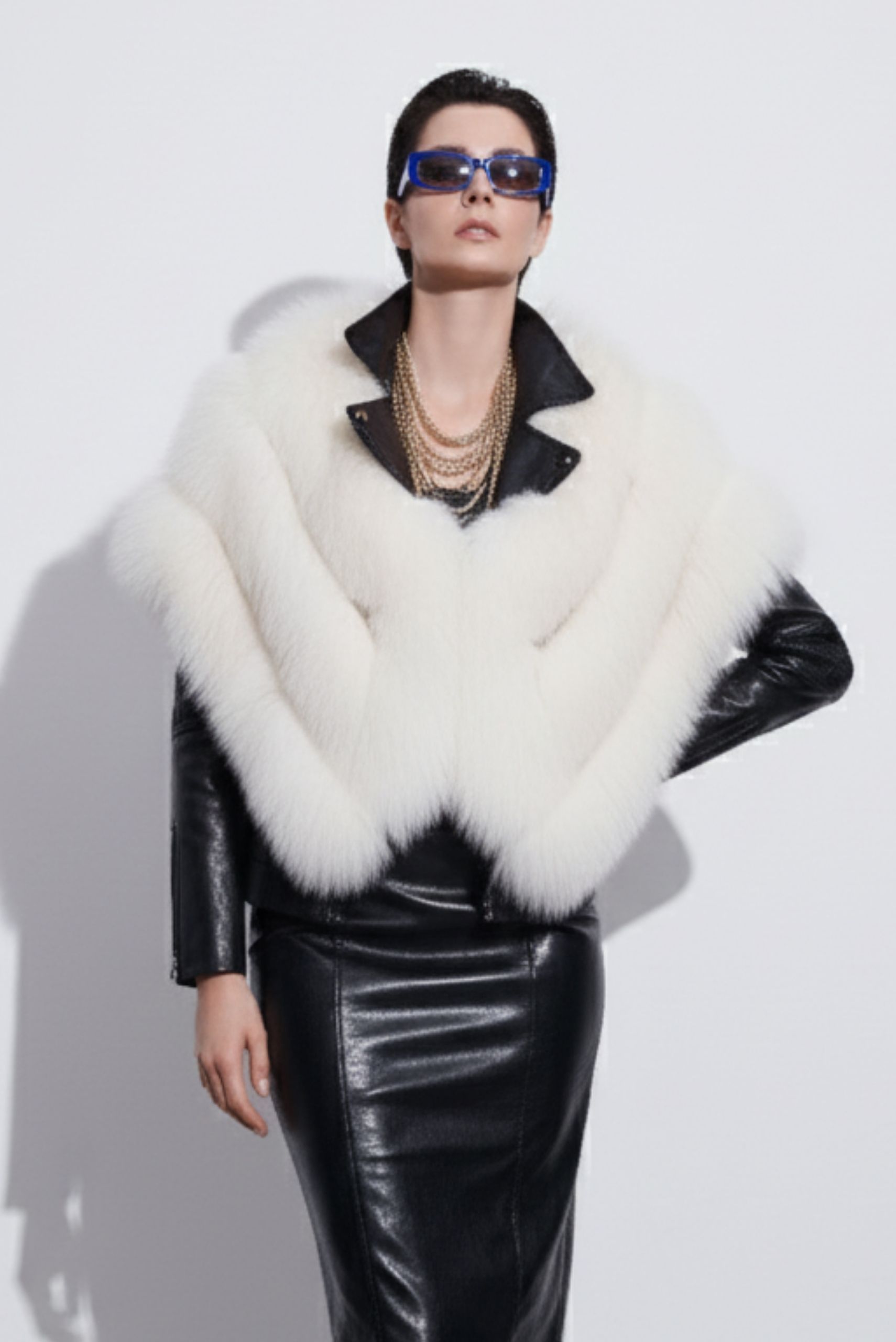 White fur coat showcased in an Istanbul boutique – part of a luxury shopping guide for timeless fur fashion.