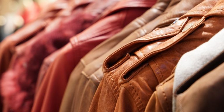 Close-up texture of genuine and faux leather jackets side by side – Koç Leather & Fur